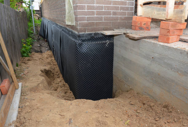SJ Waterproofing Pros technician performing targeted Emergency Waterproofing assessment in Maywood, IL